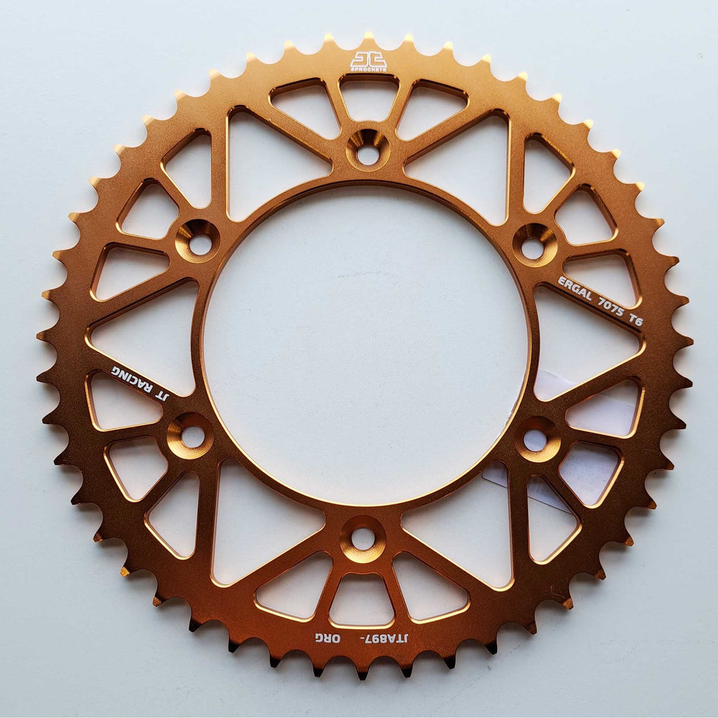 JT - Sprocket - Rear - JTA897/224U/TR130 - 520 - KTM 125-530 90-26, Husqvarna 125-501 14-26, Gas Gas 125-450 21-26, Triumph 250/450 24-26, STARK - Orange