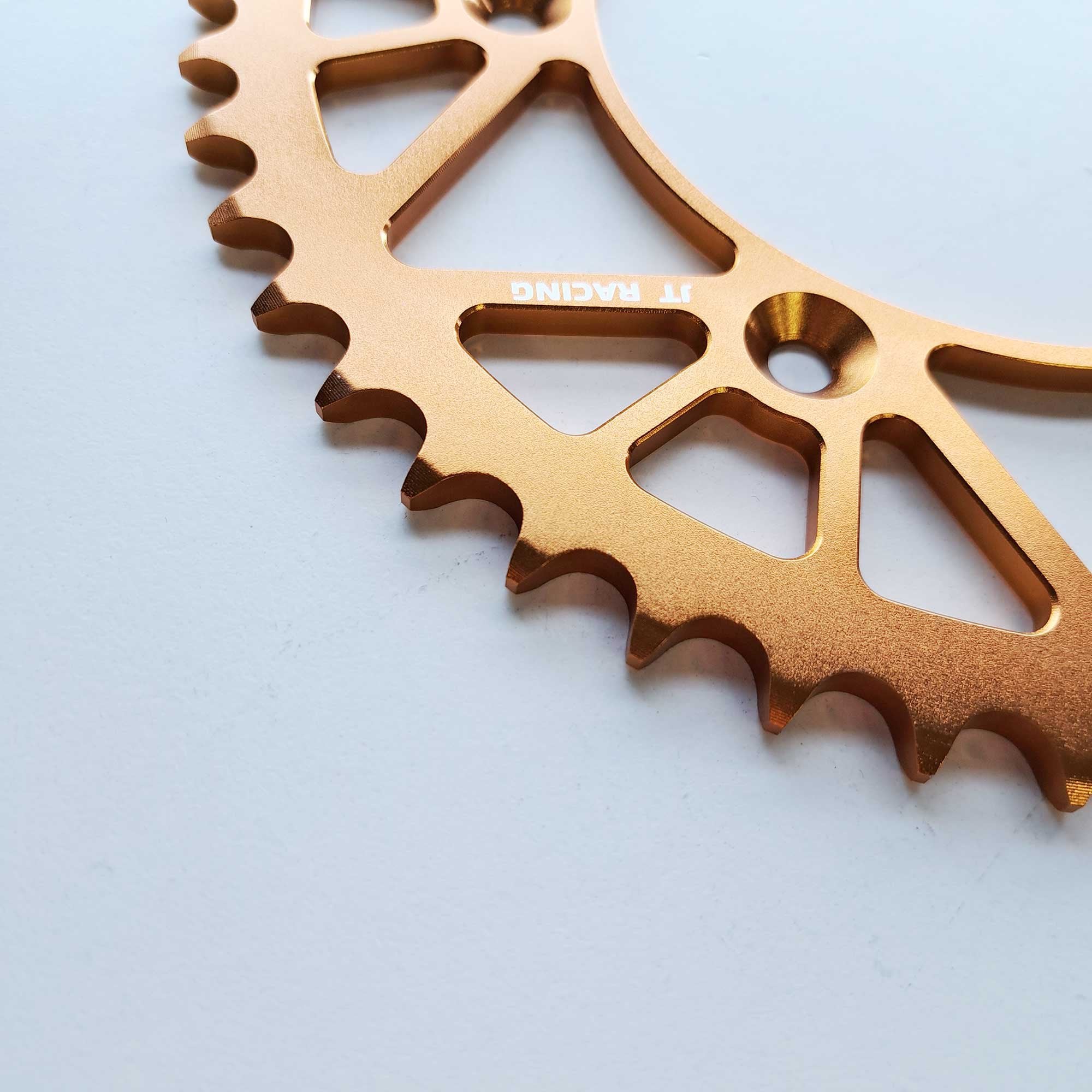 JT - Sprocket - Rear - JTA897/224U/TR130 - 520 - KTM 125-530 90-26, Husqvarna 125-501 14-26, Gas Gas 125-450 21-26, Triumph 250/450 24-26, STARK - Orange