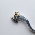 Apico - Front Brake Lever - LEB59 - Forged - KTM SX/SXF/EXC/EXCF 14-27, Husqvarna TC/FC 14-27, TE/FE 125-501 14-18  & 25-27, Gas Gas MC/MCF/EX/EXF 21-23, KXF450 24-27, STARK, Triumph, Sherco SE-R/F 15-27, TM 19-24