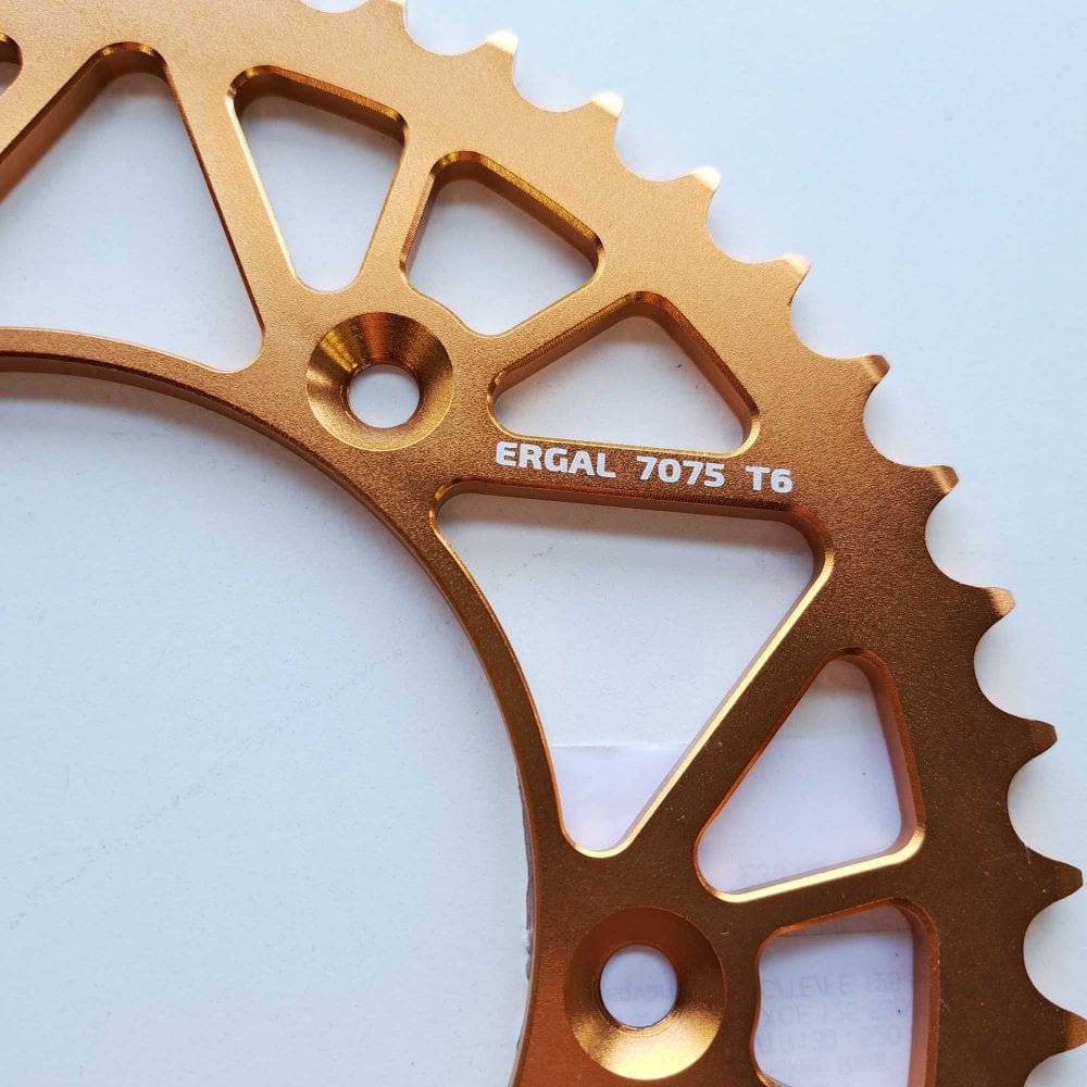 JT - Sprocket - Rear - JTA897/224U/TR130 - 520 - KTM 125-530 90-26, Husqvarna 125-501 14-26, Gas Gas 125-450 21-26, Triumph 250/450 24-26, STARK - Orange