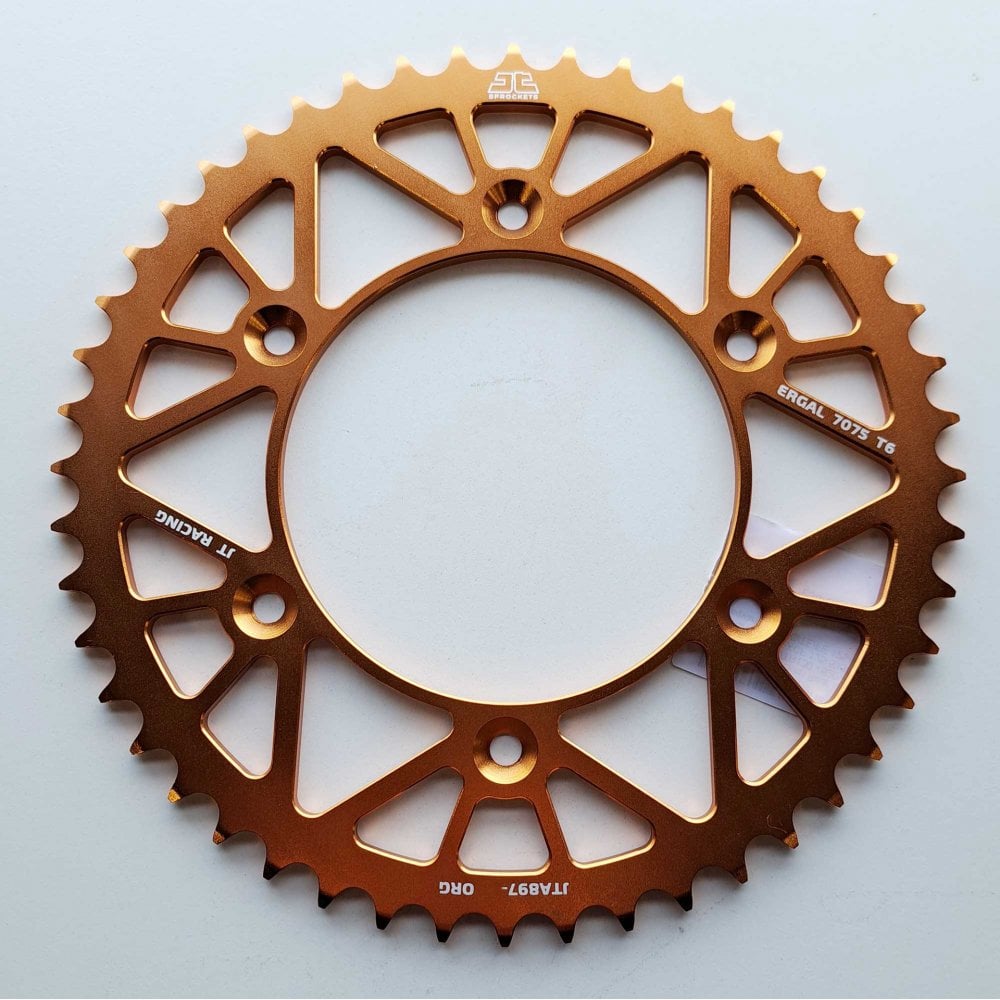 JT - Sprocket - Rear - JTA897/224U/TR130 - 520 - KTM 125-530 90-26, Husqvarna 125-501 14-26, Gas Gas 125-450 21-26, Triumph 250/450 24-26, STARK - Orange