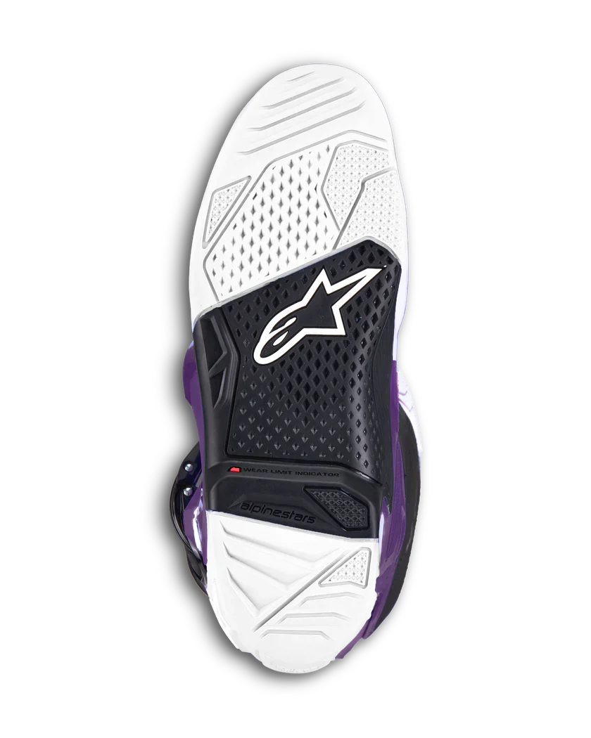 Motorcycle boot with purple and black design on a white background