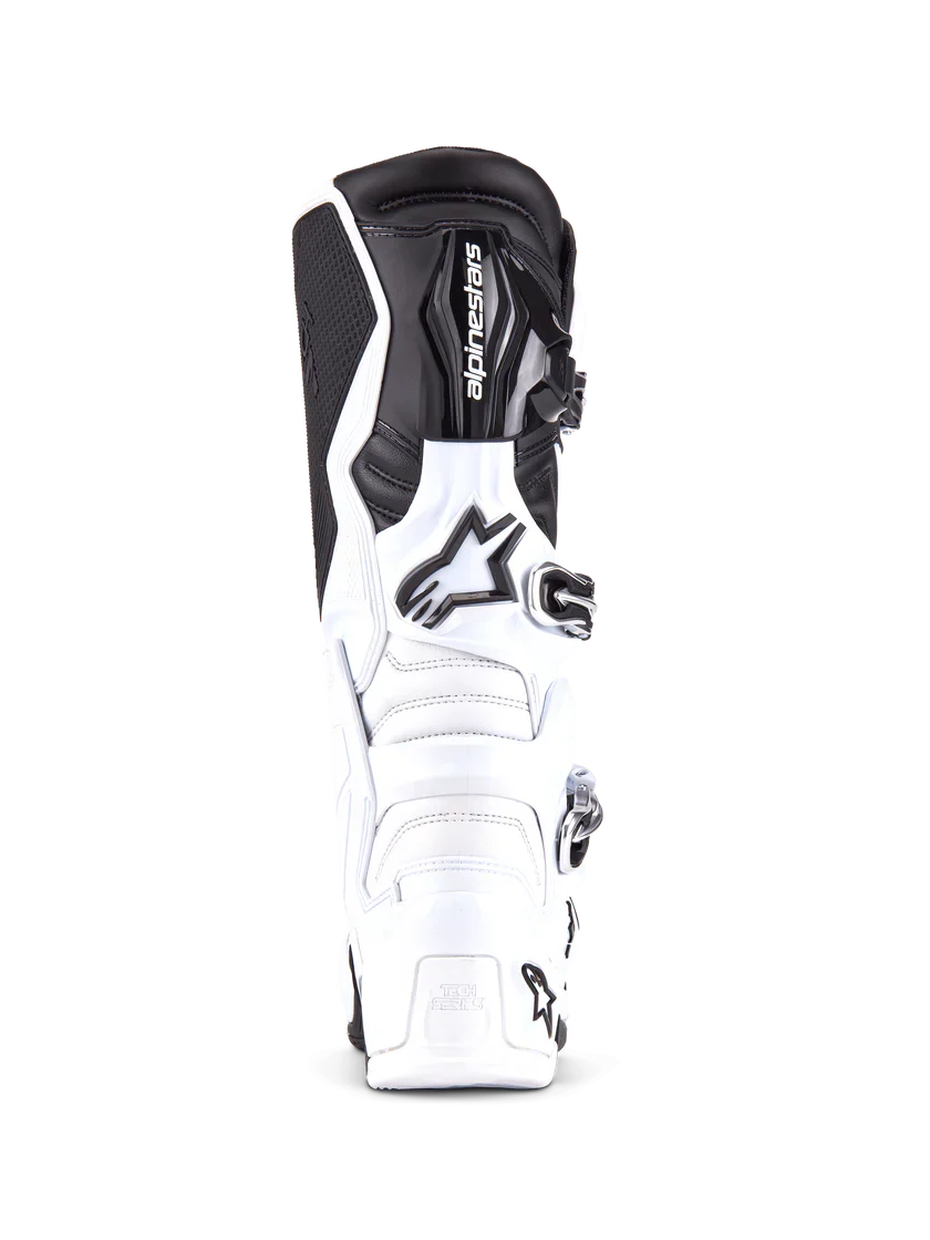 White and black motorcycle boot with brand logo on a white background