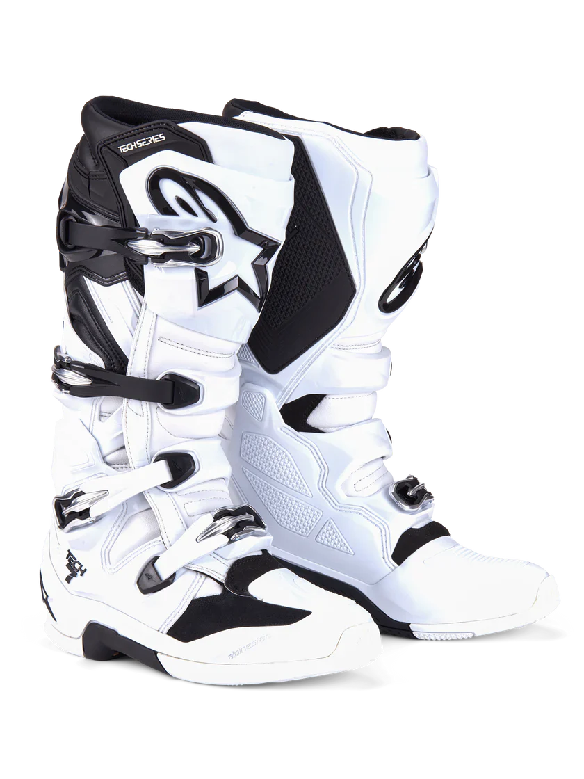 White and black motocross boots on a white background