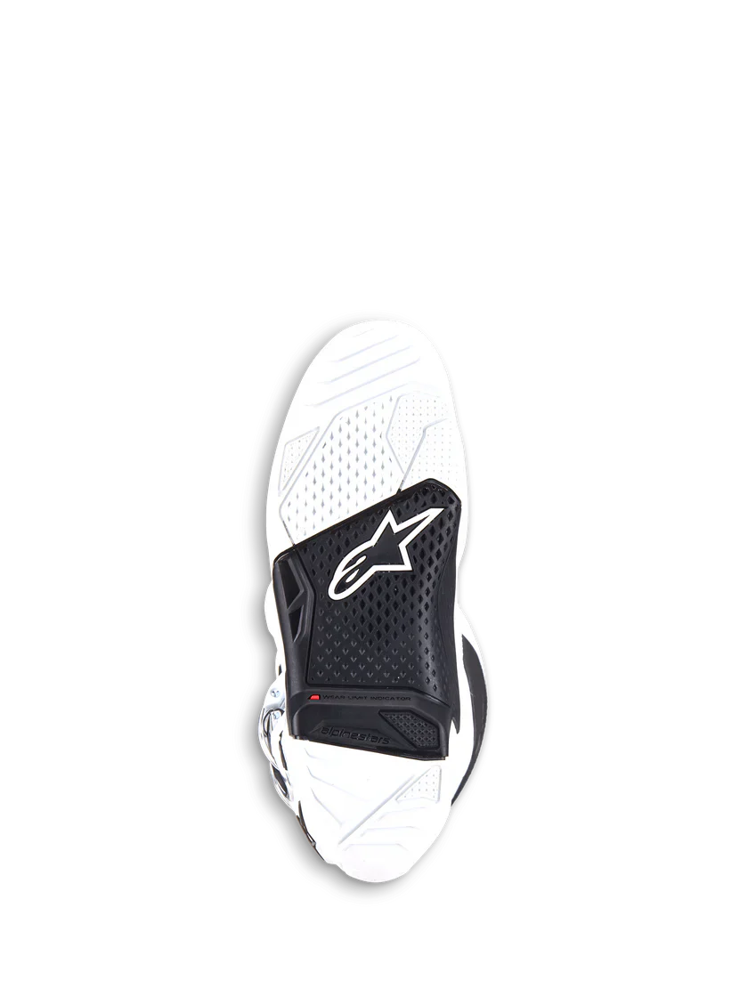 White and black motocross boot on a white background